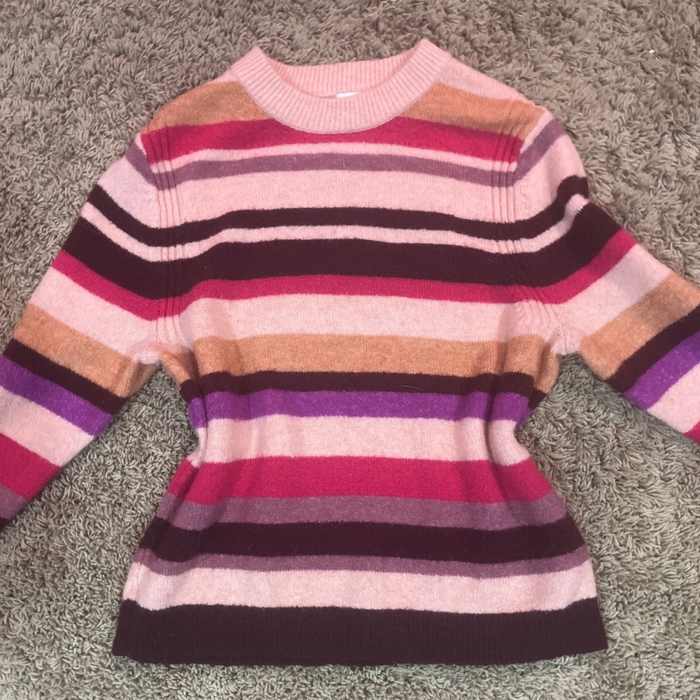 Pink, red, brown, and purple sweater